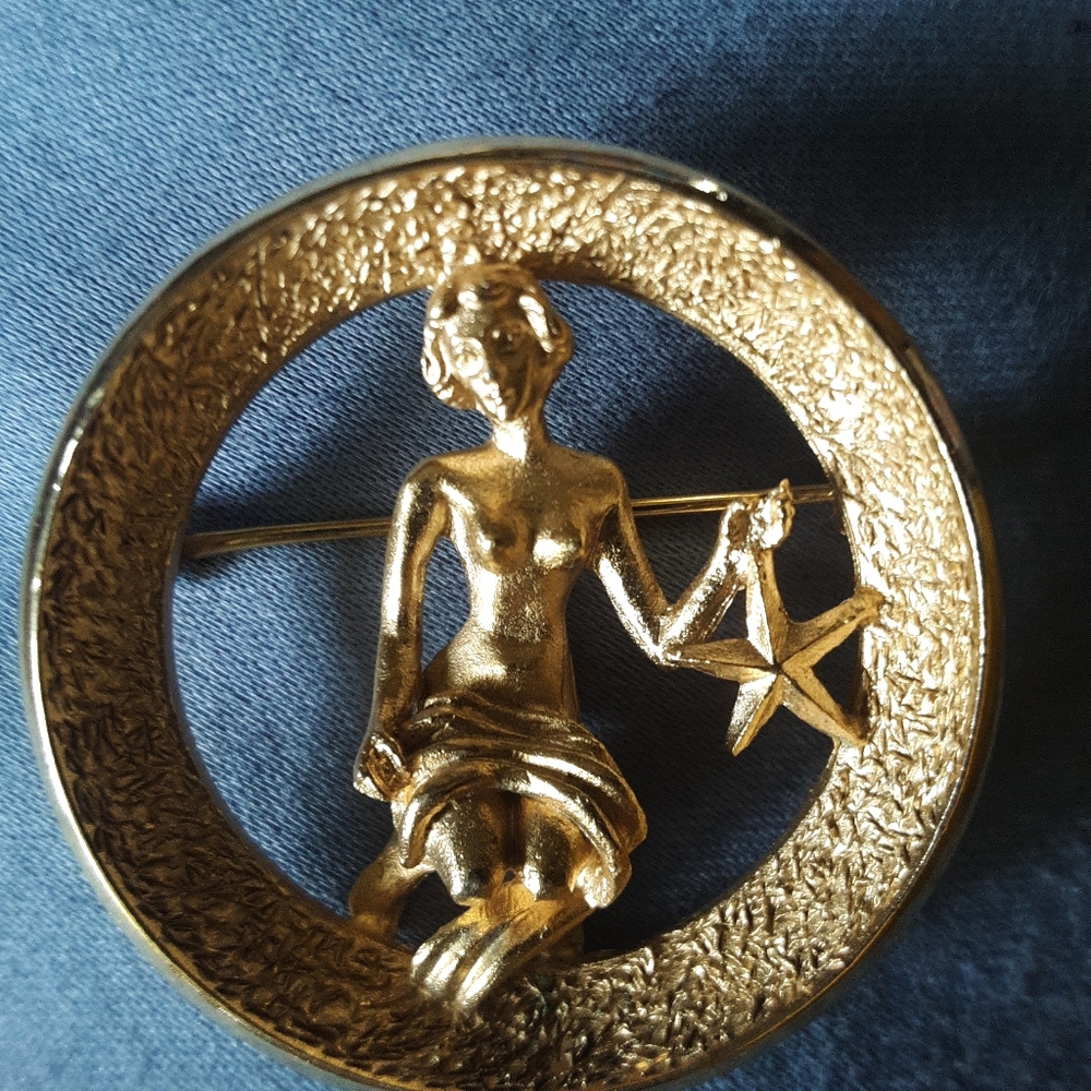 Crown Tafari Virgo horoscope brooch.